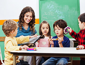 Image depicting a teacher with children